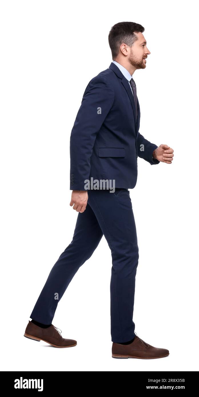Guy in suit walking Cut Out Stock Images & Pictures - Alamy