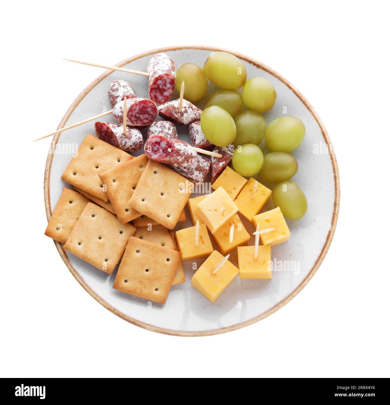 Toothpick appetizers. Tasty cheese, sausage, crackers and grapes on