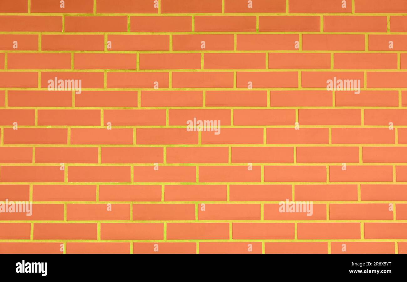 Texture of bright orange brick wall as background Stock Photo - Alamy