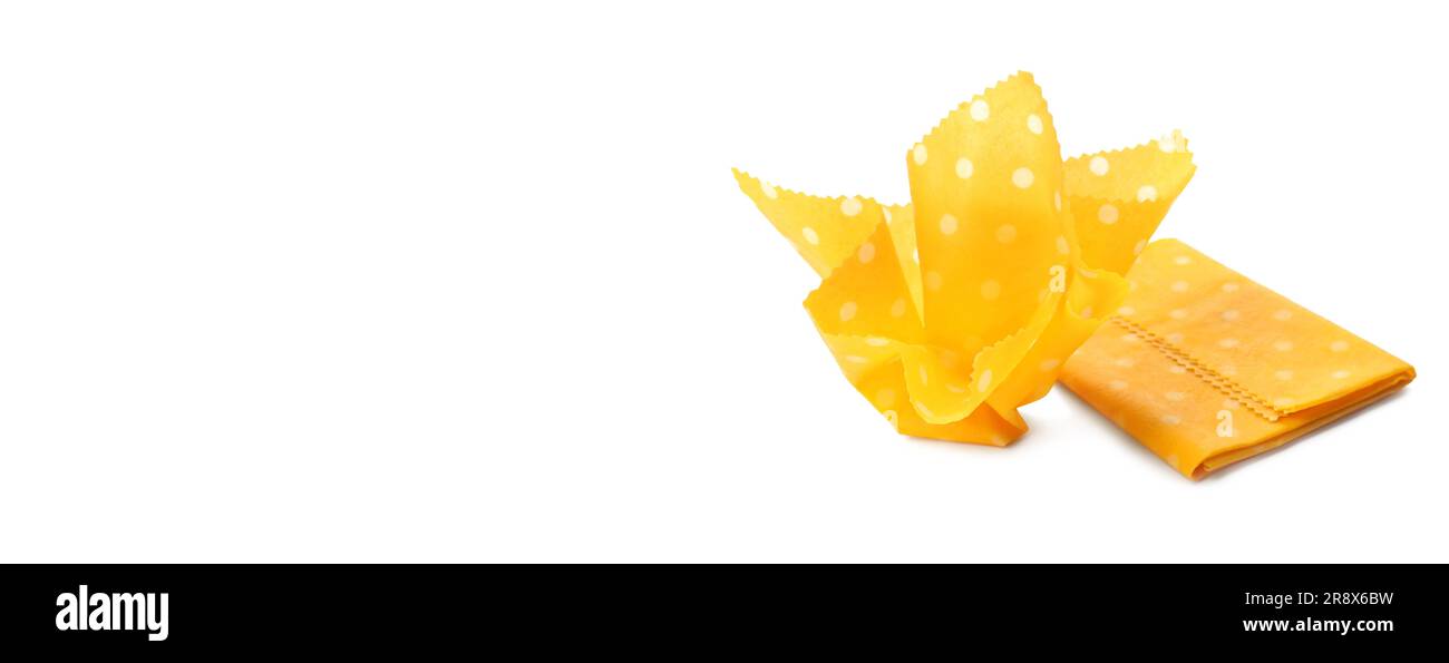 Yellow beeswax food wraps on white background, banner design Stock