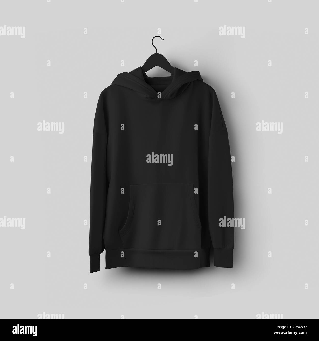 Mockup of a black long hoodie with a pocket hanging on a hanger, universal texture shirt, front view, product photography for commerce. Apparel templa Stock Photo