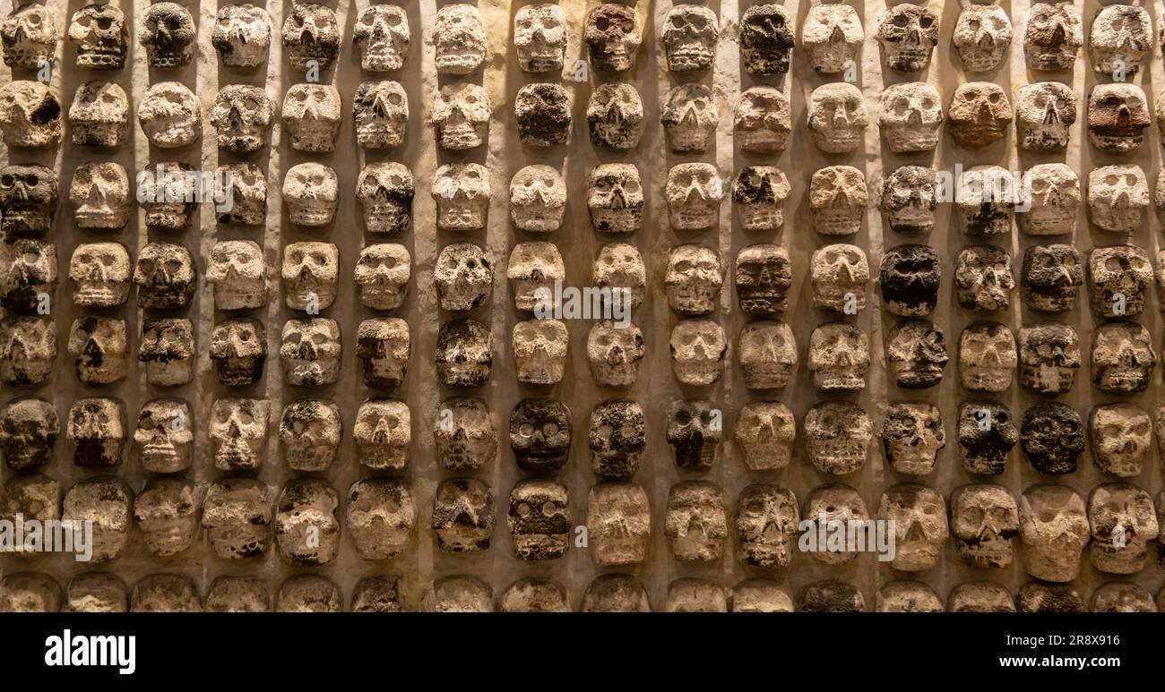 Wall of stone human skulls, archaeological site and museum of Templo