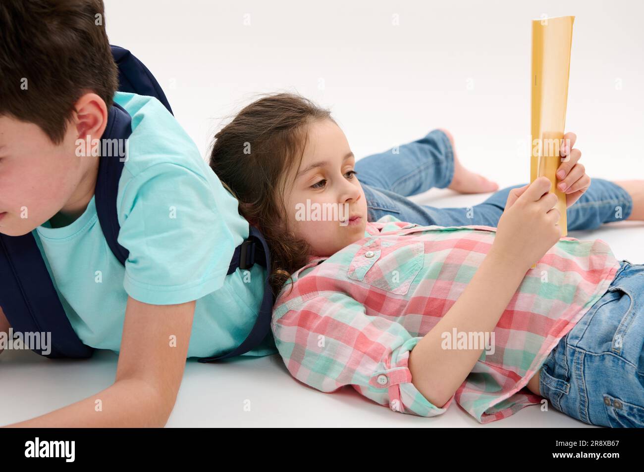 Preteen girl lying on back hi-res stock photography and images - Alamy