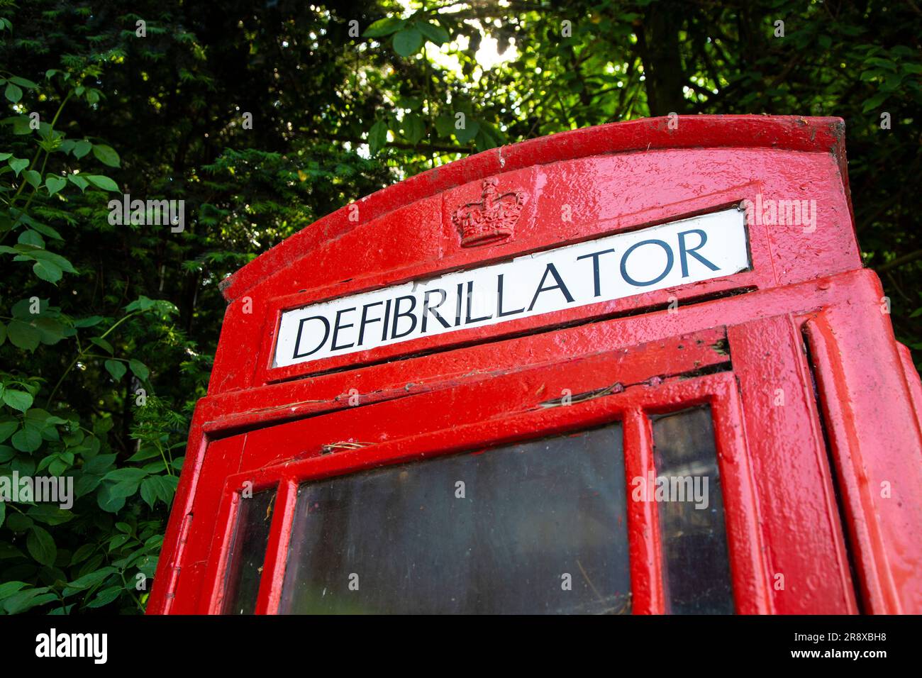 Converted telephone box with defibrillator in Wendover, Chiltern Hills, England, UK Stock Photo