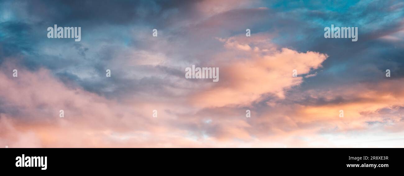 Dramatic colorful sky with clouds in the sunset natural background ...