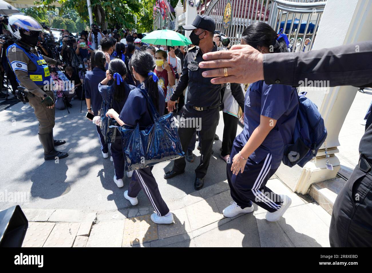 Students leave a high school as a fire extinguisher exploded during the ...