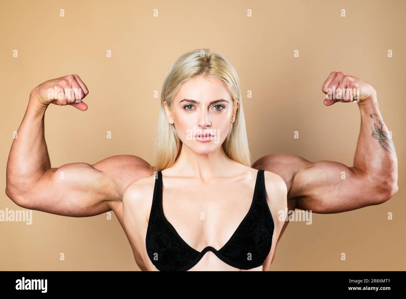 Fit Woman Flexing Back Muscles Stock Photo - Download Image Now