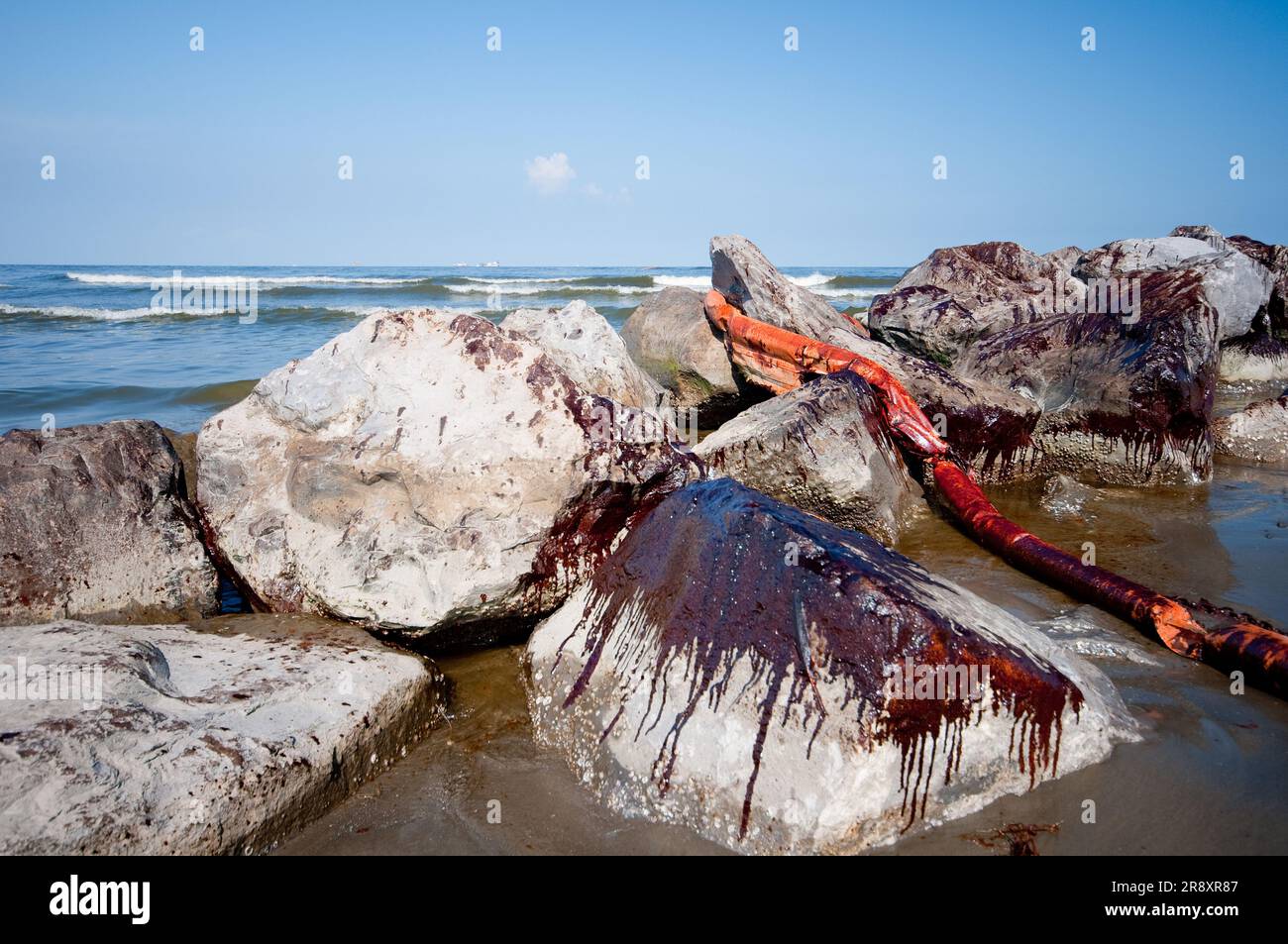 Oil splashed up over the jetty on Grand Isle State Park. The jetty along Barataria pass Stock