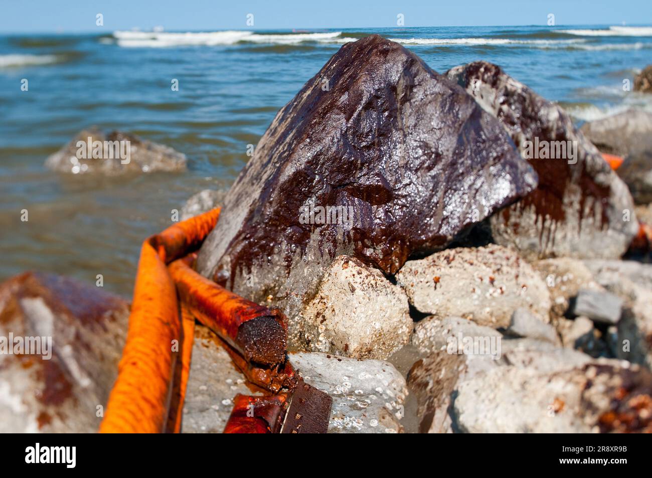 Oil splashed up over the jetty on Grand Isle State Park. The jetty along Barataria pass Stock