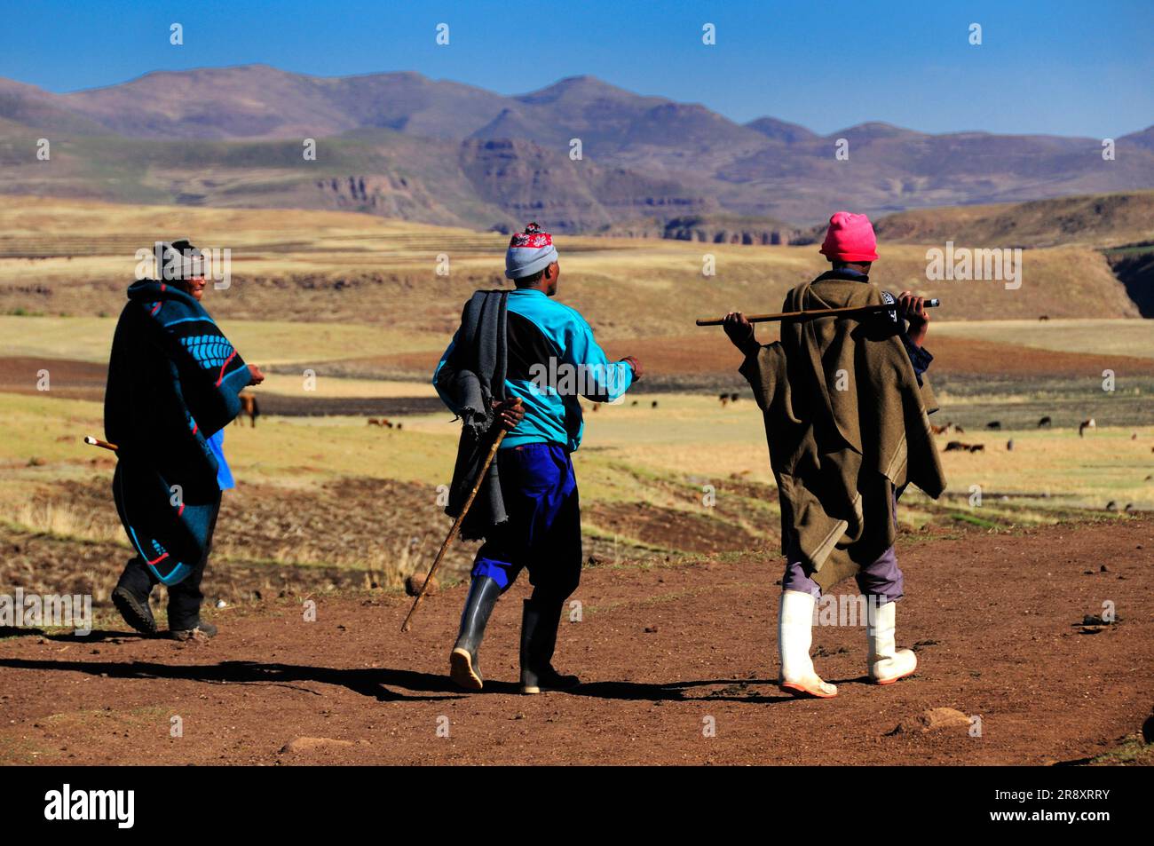 Basotho people walking near Semonkong, Lesotho, South Africa Stock Photo