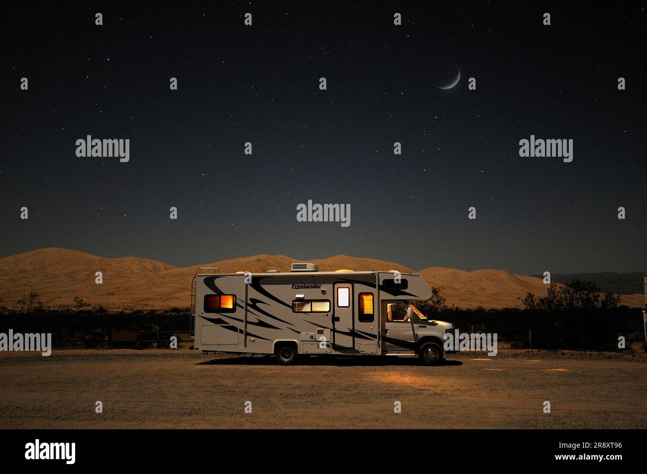 Stars over an RV camper at Kelso Dunes, Mojave National Preserve, Kelso, California, USA Stock Photo