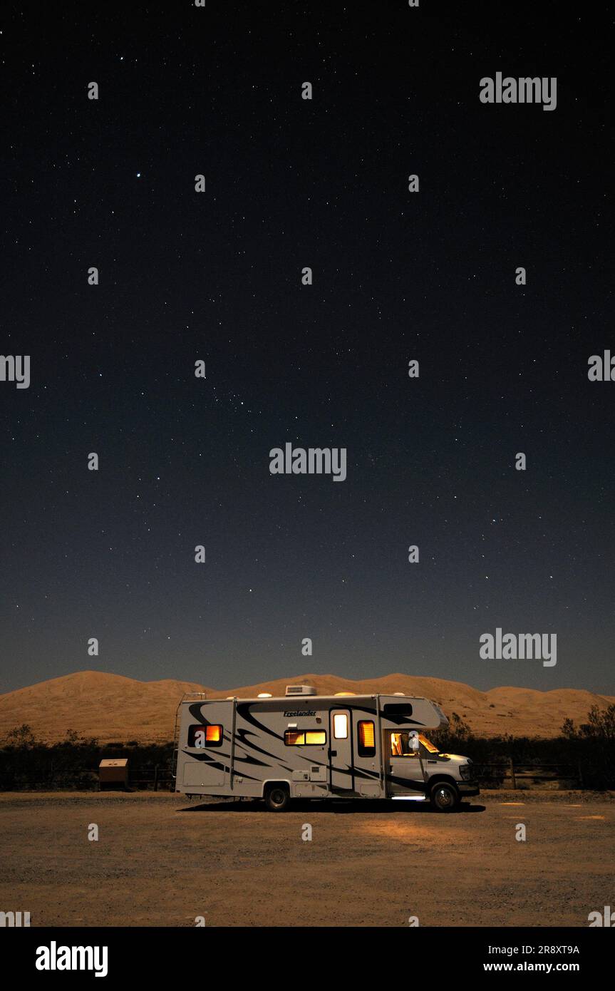 Stars over an RV camper at Kelso Dunes, Mojave National Preserve, Kelso, California, USA Stock Photo