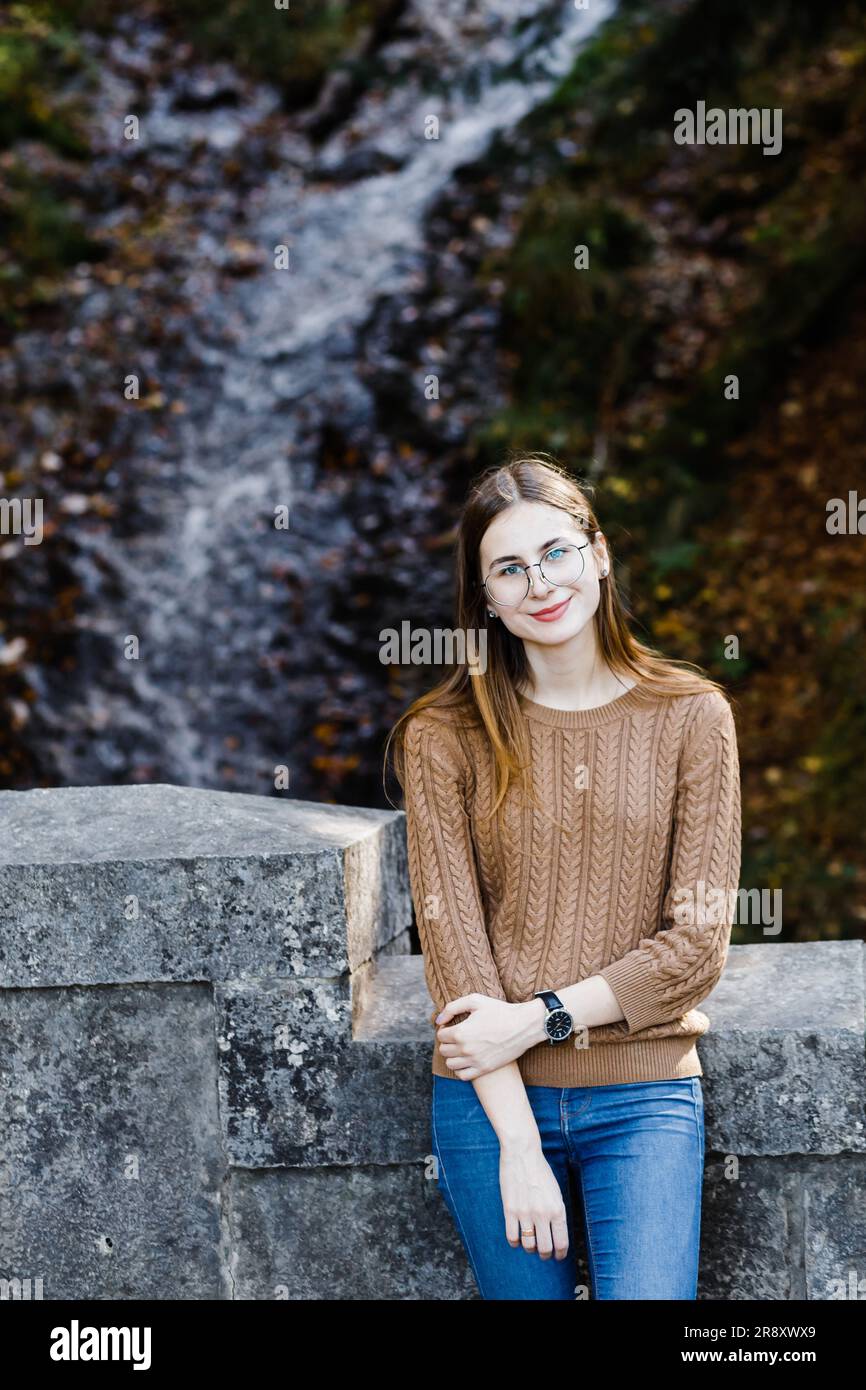 young female tourist on a walk in the Austrian forests Stock Photo