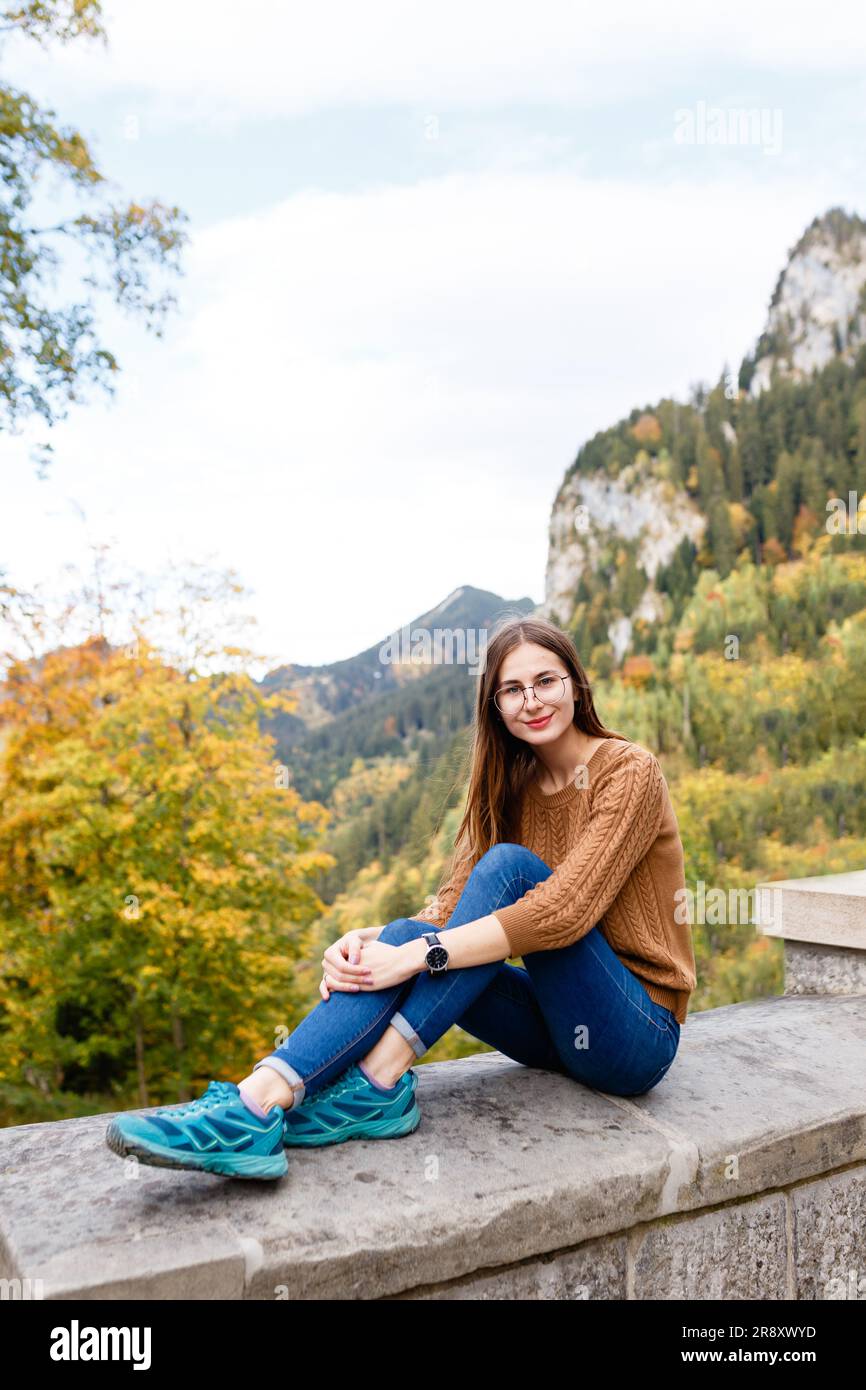 young female tourist on  alpine mountains and forests in Austria Stock Photo