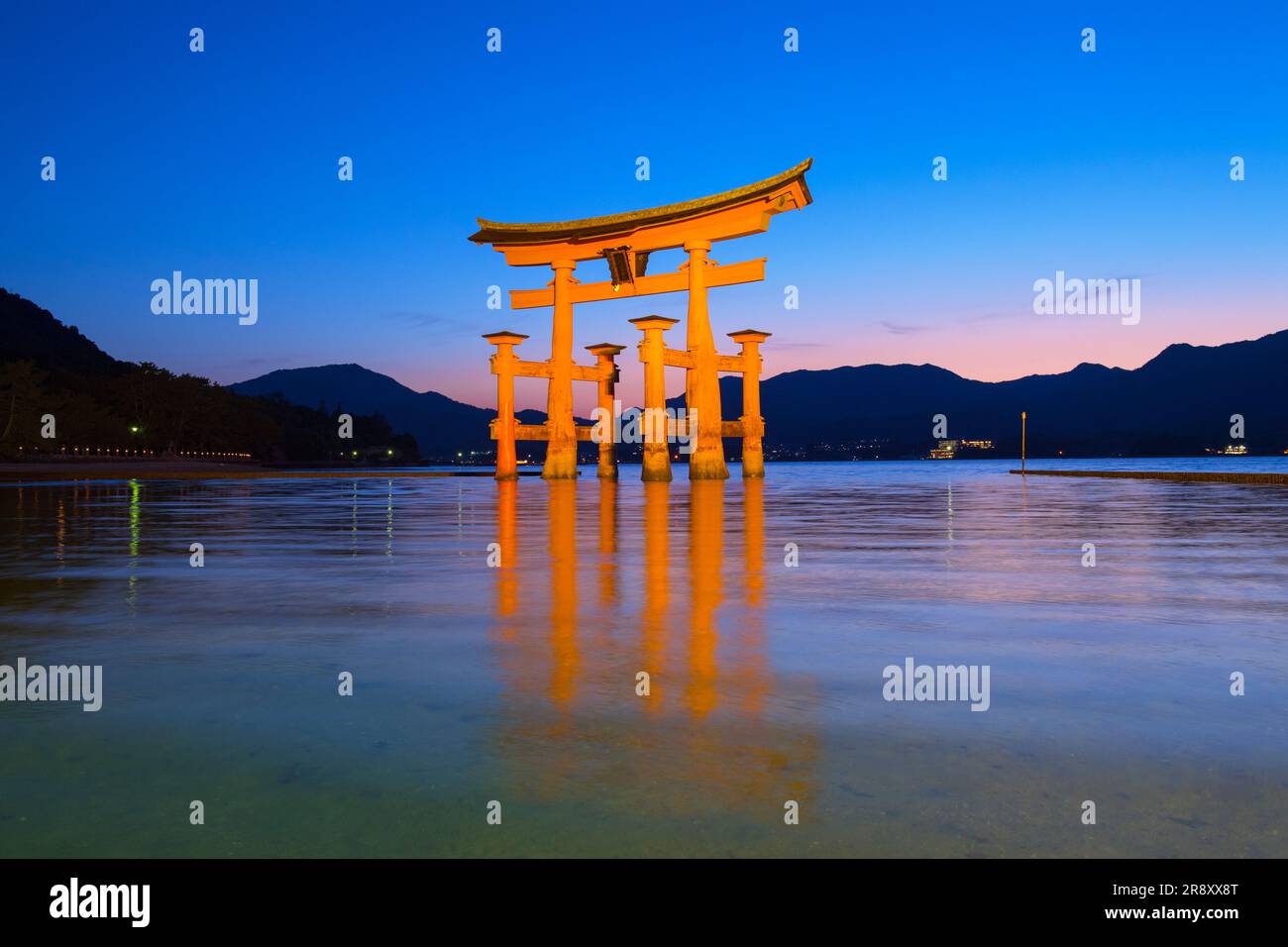 evening view of Otorii gate of Itsukushima Shrine Stock Photo - Alamy