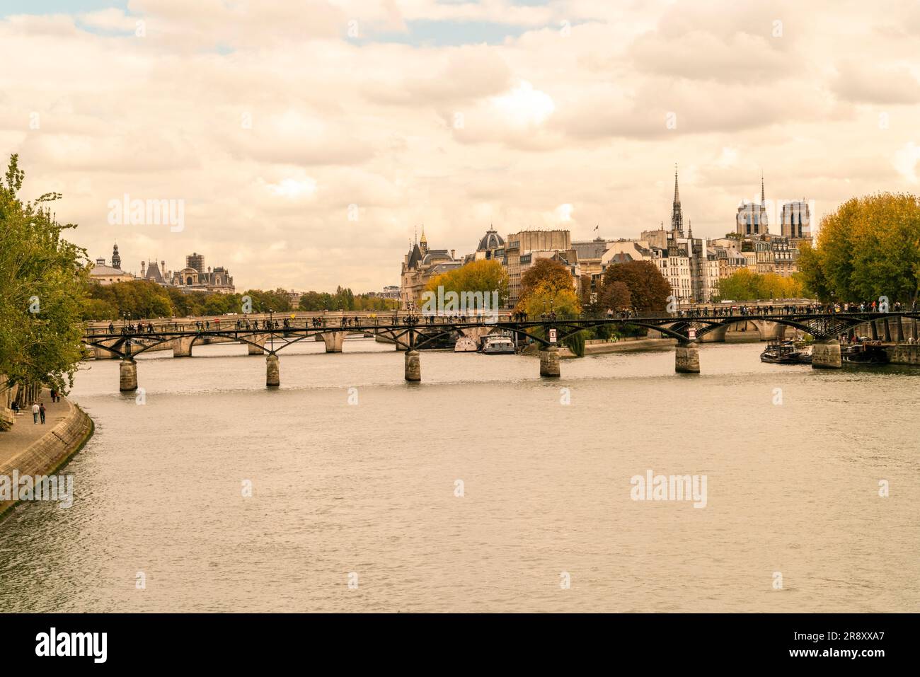 Seine River with Pont des Arts bridge and Notre Dame, Paris, France ...