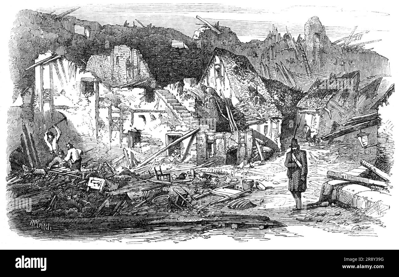 The Late Explosion at Mayence - the Old Kastrick Street, 1857. 'This old town, the nearest fortress on the frontier towards France, and the strongest hold of the German Bund, suffered...a most grievous calamity...a tremendous explosion, with, a shock like an earthquake, made town, fortress, and surrounding country rock again. The powder- magazine in the south-west quarter, called the Kastrich of the town, near the Boniface battery, was in the air...The long street called the Old Kastrich was immediately a heap of limestone rubble, broken rafters, and shattered walls; a huge black smoking crate Stock Photo