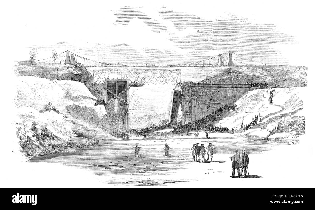 Scene of the Recent Accident on the Great Western Railway, near Hamilton, Canada West, 1857. Aftermath of '...the most terrible railroad accident that has ever occurred in that colony...Just before reaching the bridge over the Desjardins Canal the [Toronto] train left the track, by a misplacement of a switch or some other cause, and ran upon the bridge. The force of the train knocked the bridge down, and engine and cars and all plunged into the canal, thirty or forty feet below. The catastrophe was sudden and awful, and the work of death was instantaneous and complete. The locomotive and tende Stock Photo