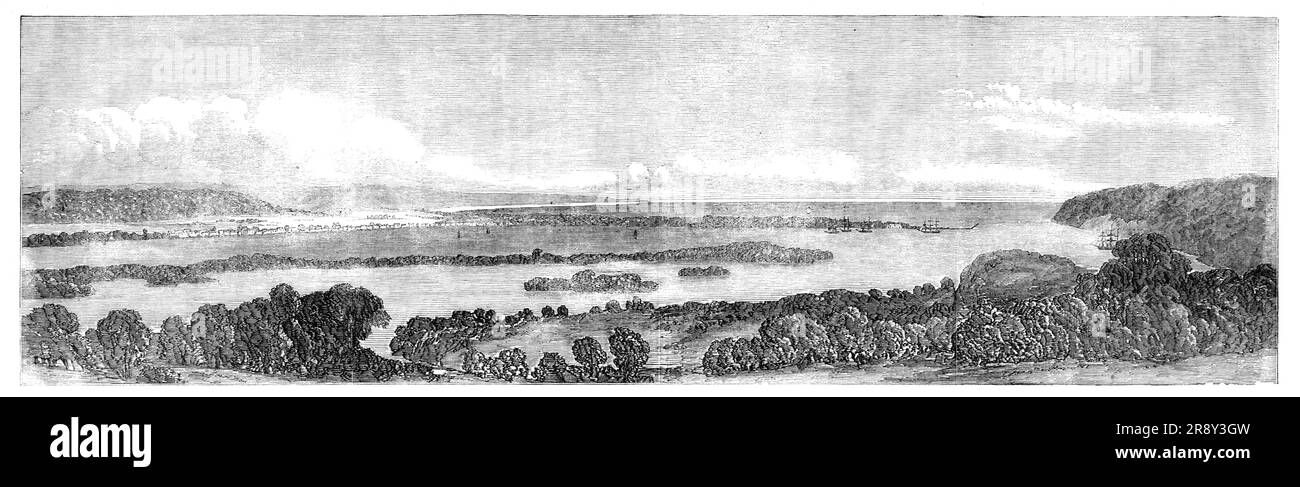 The Bay of Natal, 1857. View in South Africa, from a sketch by Mr. James B. West. 'Natal has been described as a long strip of country in South Africa, along the coast and inland as far as the Drakenaberg, or Quathlamba Mountains, its port lying 1000 miles to the north-east of the Cape of Good Hope. Of this grand natural feature [the engraving] presents a strikingly picturesque view'. From &quot;Illustrated London News&quot;, 1857. Stock Photo