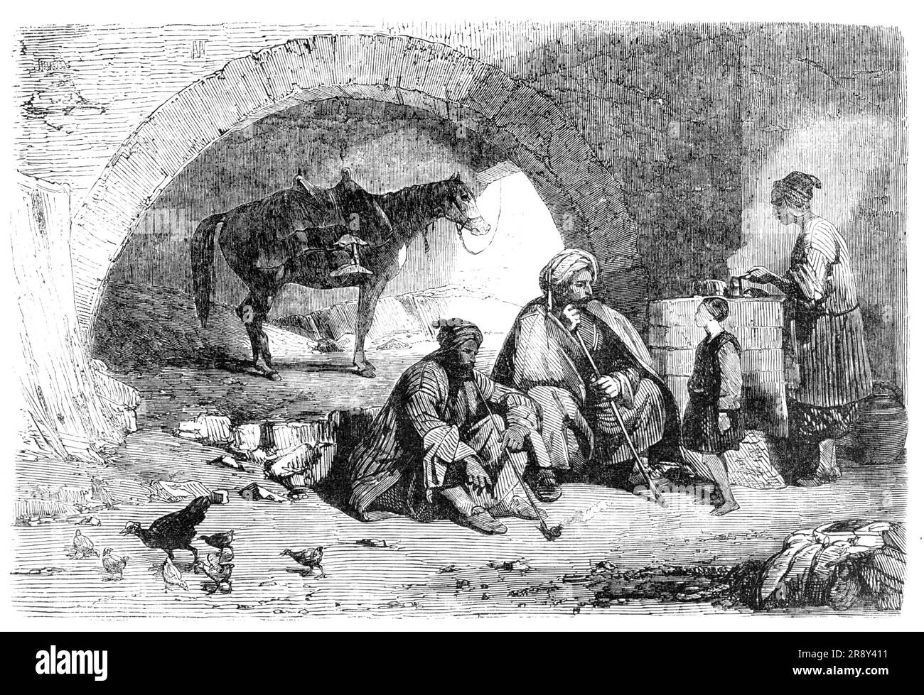 The Desert Route - Khan near Nahar-el-Kelb, the Ancient Lycus, three leagues from Beyrout, 1857. 'The Khan, as you perceive, is a wretched old affair, damp, and full of rubbish. Here, at a temporary charcoal stove, a poor coffegee is eternally making coffee for casual droppers-in; while his boy, in what was once a white skullcap, is handing the small cups to and from the guests. Two recent arrivals are seen partaking of this luxury. The horse is probably...the property of both, on which they perform their journeyings alternately - the distinguishing sign of their intentions being the unlooseni Stock Photo