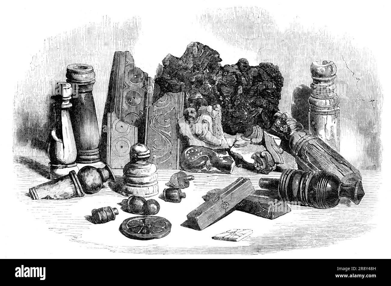 Relics from the Buried City of Brahmunabad, in Sind - Chessmen, Portion of Chess-board, Dice, etc, 1857. 8th- or 9th-century objects excavated at his own expense by Mr. A. F. Bellasis, of the Bombay Civil Service, in what is now Pakistan. 'Figs. 10: chessmen, belonging to different-sized sets; [Bellasis said: &quot;In this same house we were further repaid by finding nearly a complete set of ivory chessmen - one set white, the other black. The kings and queens are about three inches high, and the pawns about one; the other pieces of different intermediate heights. All have been made for use on Stock Photo