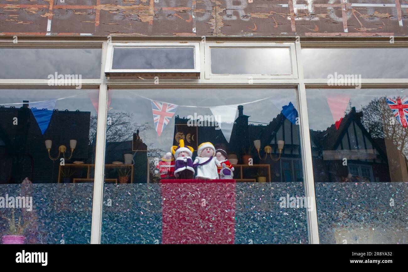 Knitted king and queen figures in a Scarborough window during the coronation Bank Holiday weekend Stock Photo