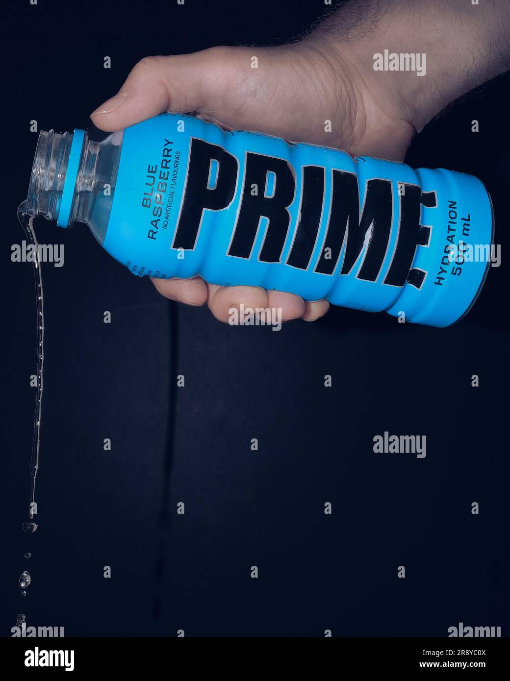 https://c8.alamy.com/comp/2R8YC0X/bottle-of-prime-hydration-energy-drink-blue-raspberry-popular-beverage-by-youtubers-ksi-and-logan-paul-2R8YC0X.jpg