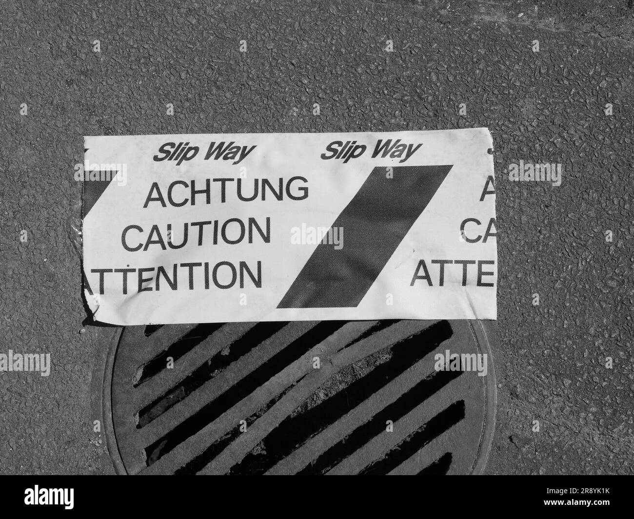 achtung translation caution attention slip way sign Stock Photo