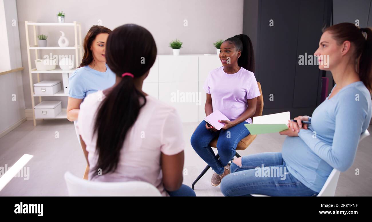 Pregnant Expecting Women Group Class. Pregnancy And Maternity Stock