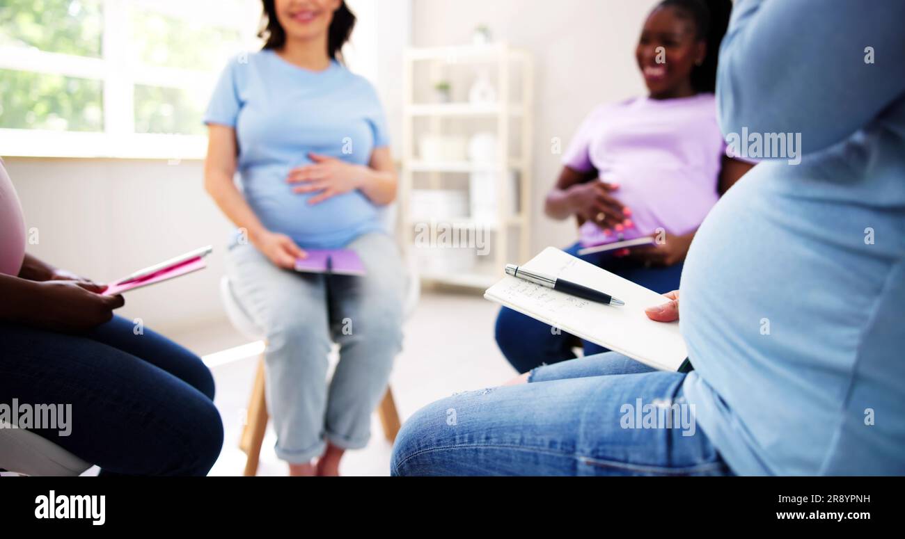 Pregnant Expecting Women Group Class. Pregnancy And Maternity Stock