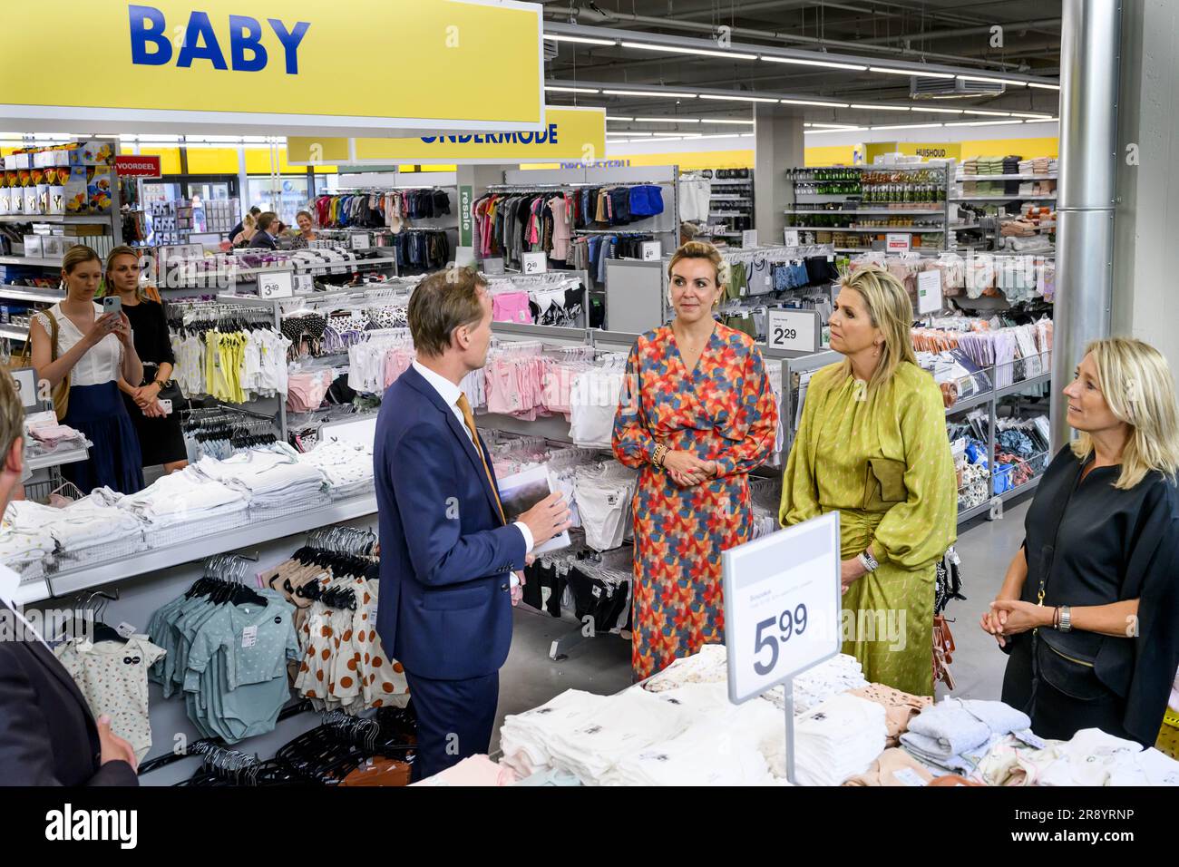 ALPHEN AAN DEN RIJN 23/06/2023, Queen Maxima (2eR) visits a store of textile chain Zeeman