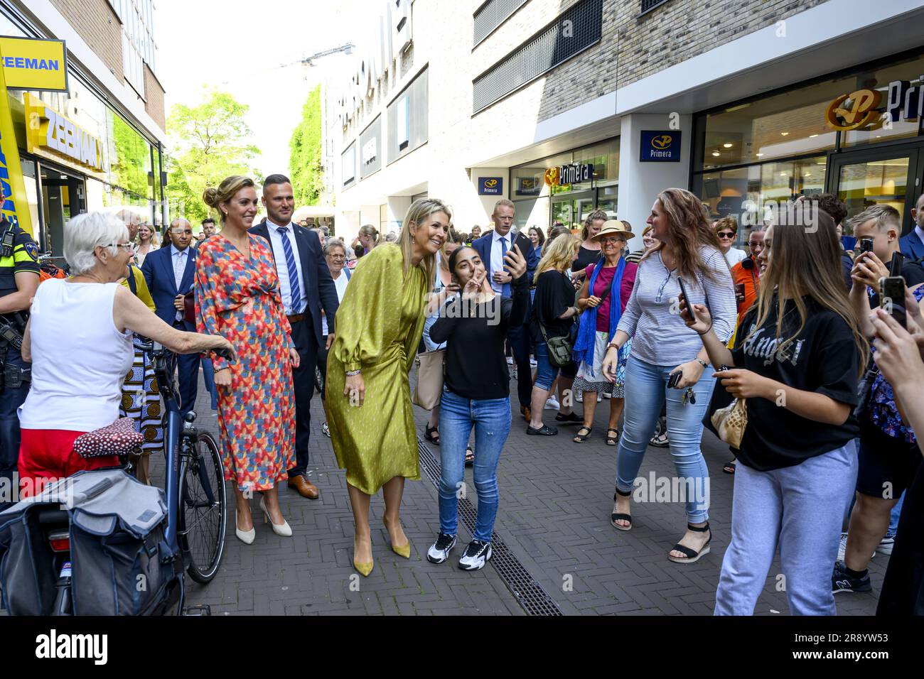 ALPHEN AAN DEN RIJN - Queen Maxima (M) takes a picture with passers-by  during a visit together with State Secretary Vivianne Heijnen  (Infrastructure and Water Management) to a store of the Zeeman
