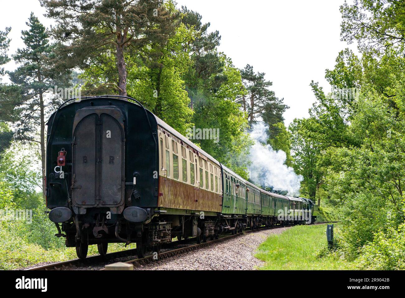 KINGSCOTE, SUSSEX/UK - MAY 23 : Rebuilt Bulleid Light Pacific No. 34059 steam locomotive near Kingscote Station on May 23, 2009. Three unidentified Stock Photo