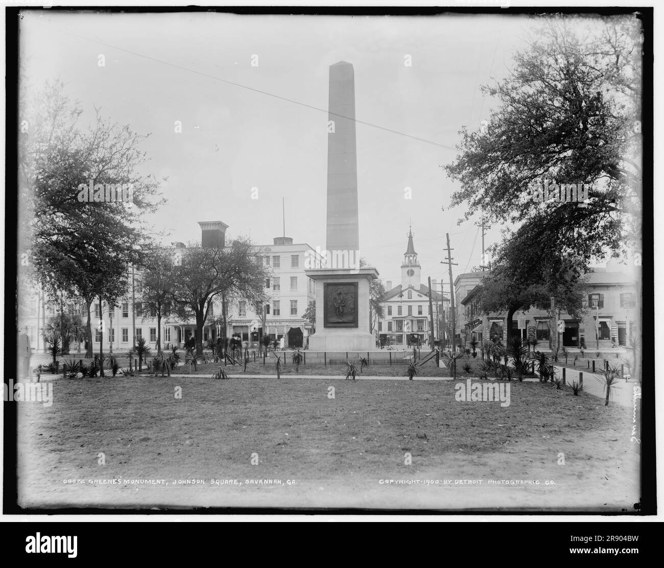 Greene's Monument, Johnson Square, Savannah, Ga., c1900. The Nathanael Greene Monument, designed by William Strickland, commemorates Major-General Nathanael Greene, an American military officer and planter who served in the Continental Army during the Revolutionary War. Greene's body was reinterred under the monument in 1902. Stock Photo