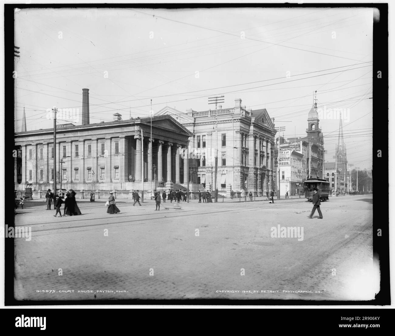 Court house, Dayton, Ohio, c1902. The Montgomery County Courthouse (on left) was designed in Greek Revival style by Howard Daniels and built in 1847. The limestone building, also known as the Old Courthouse, was modelled on the 5th century BC Temple of Hephaestus in Athens, Greece. In 1881-1884, a new, larger county courthouse was built beside the original building. The two were connected by a hallway, Stock Photo