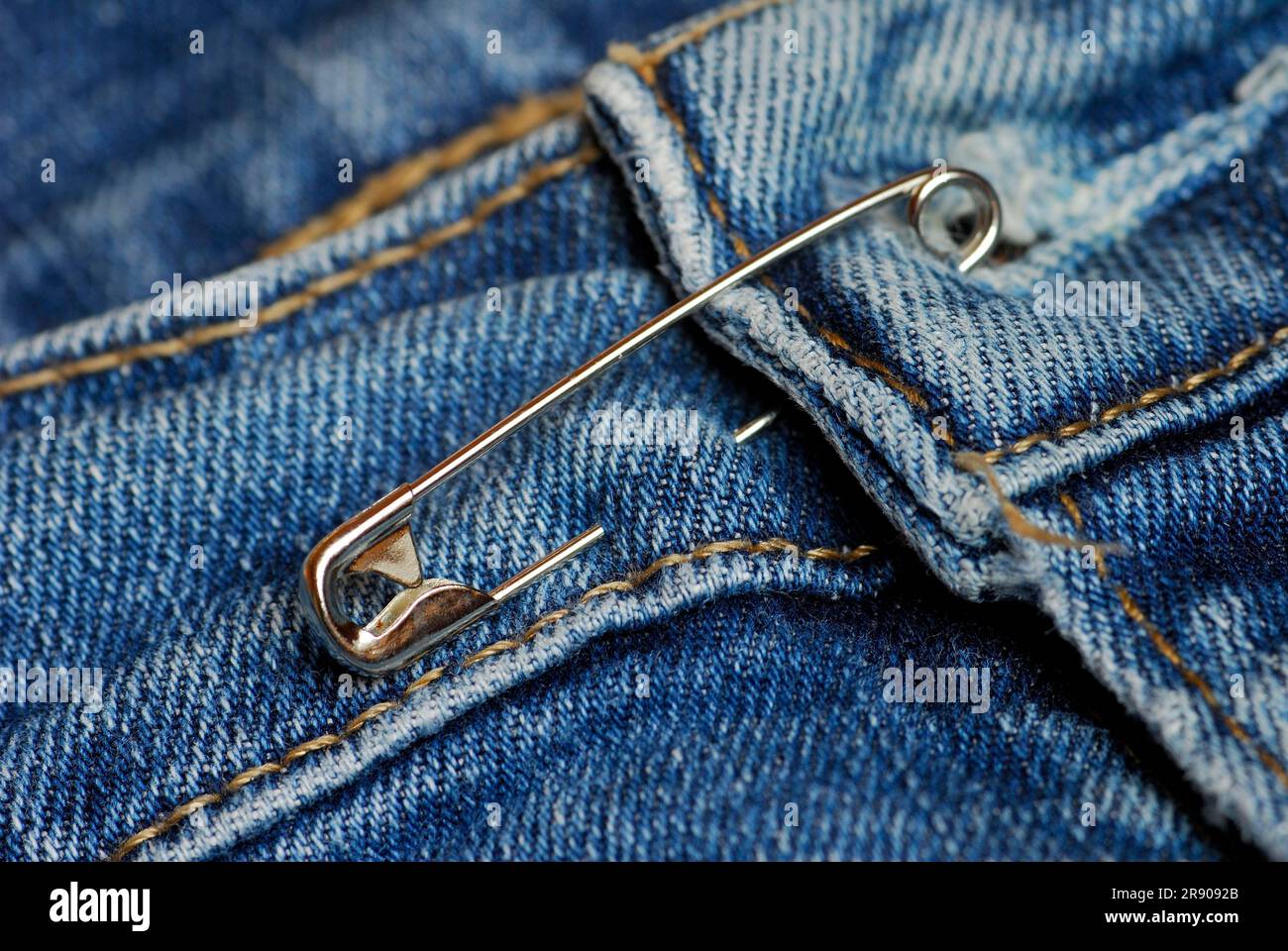 Safety pin piercing hi-res stock photography and images - Alamy