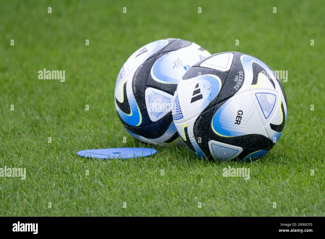 Batumi, Georgia. 23rd June, 2023. Two Adidas footballs lie on the pitch during the training of the German U21 national team. The racist insults against U21 players at the European Championship continue to preoccupy the German team the day after the 1:1 start against Israel. Credit: Sebastian Kahnert/dpa/Alamy Live News Stock Photo