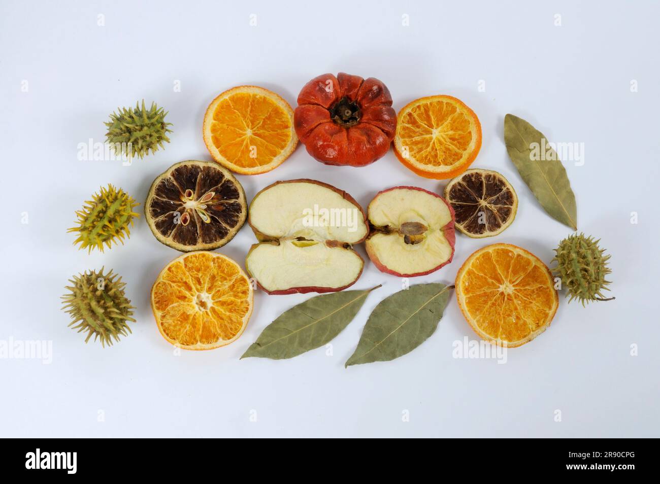 Dried fruits for decoration, apple, orange, bay leaf, lime, fruit potpourri, decorative fruits Stock Photo