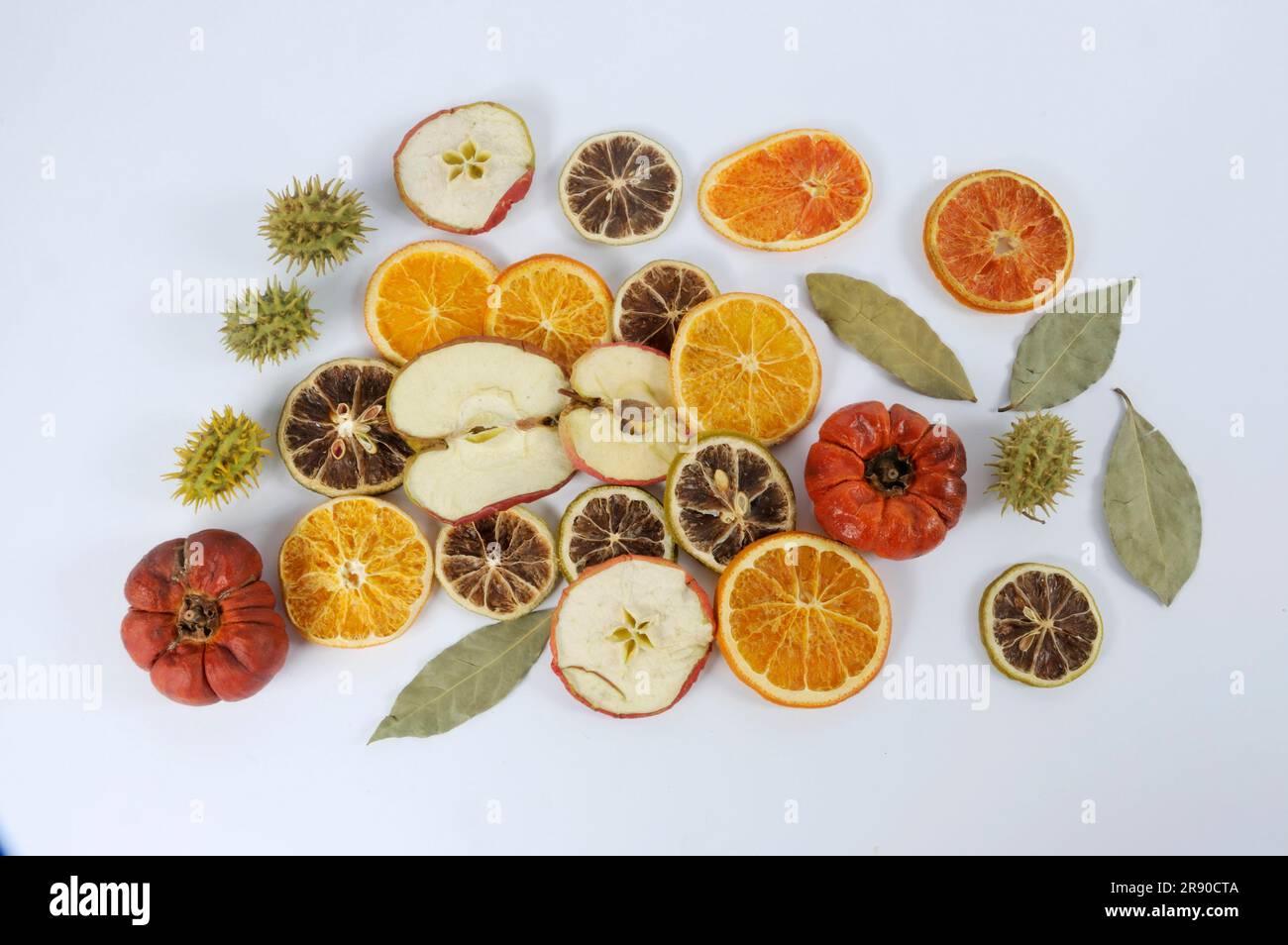 Dried fruits for decoration, apple, orange, bay leaf, lime, fruit potpourri, decorative fruits Stock Photo