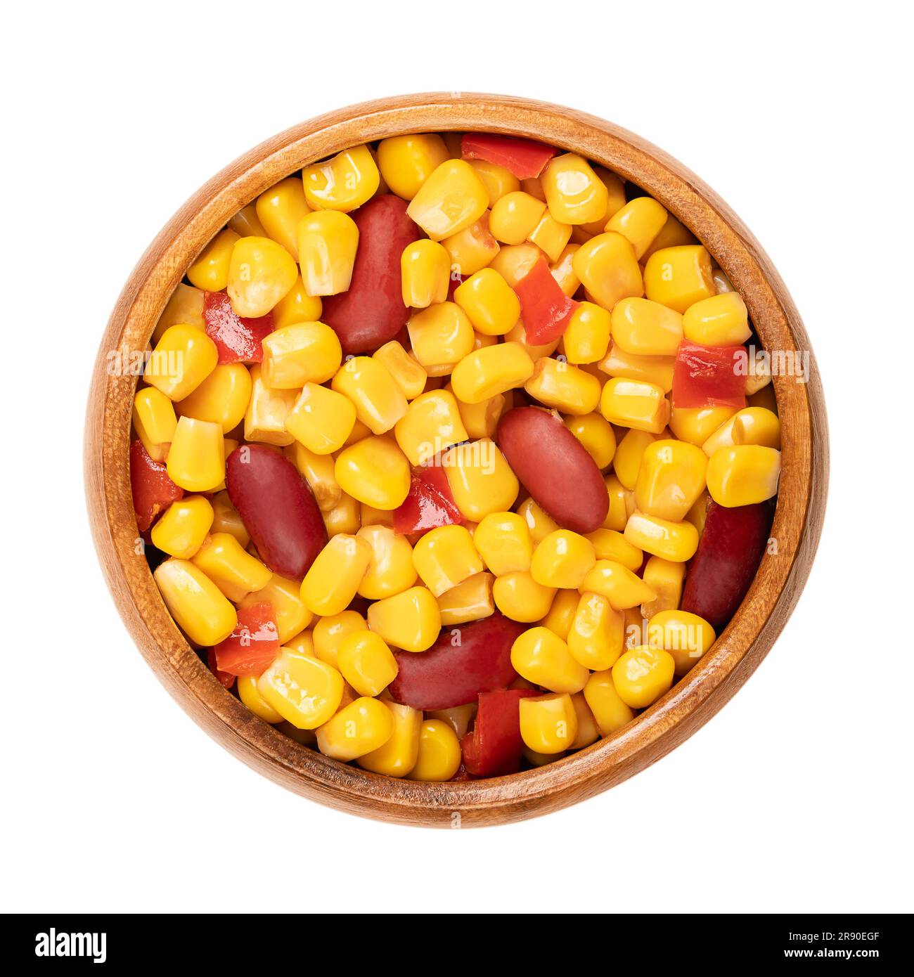 Mix of canned corn, red kidney beans and diced bell pepper, in a wooden bowl. Ready to eat Texas maize mix, as a side dish to a barbecue. Stock Photo