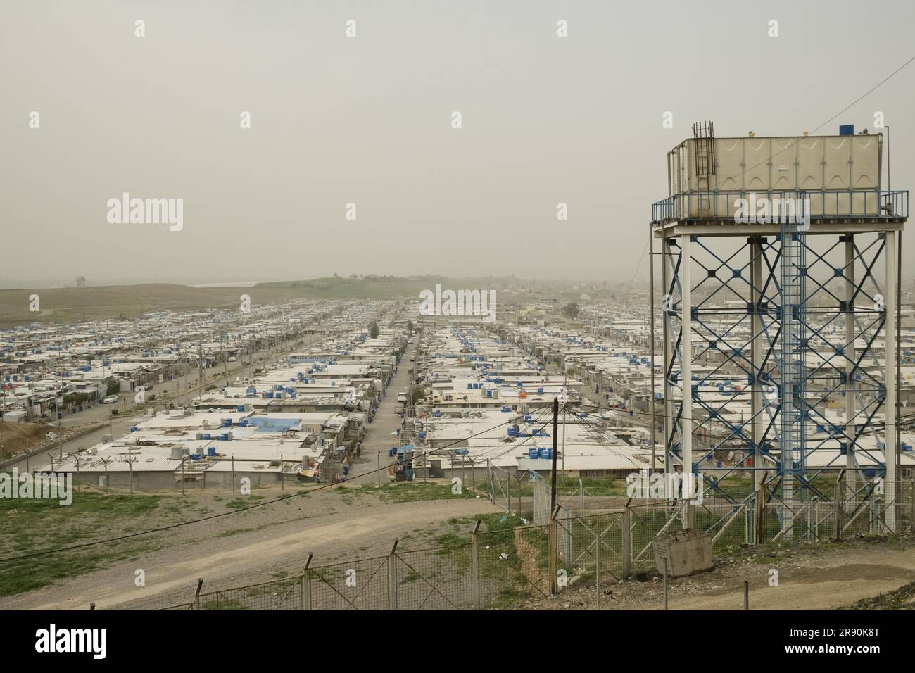 Gabriel Gauffre / Le Pictorium -  Bashur -  17/3/2021  -  Iraq / Iraqi Kurdistan / Erbil  -  View of the Kawergosk refugee camp.  From the ashes of the 2003 American invasion of Iraq and the toppling of Saddam Hussein's regime, Iraq's Kurds managed to wrestle a form of relative independence. Still technically part of Iraq, Iraqi Kurdistan, in the north of the country, enjoys a heightened level of independence.  To the Kurds, it is Bas?r (Bahsur), the southern province of the 4 composing what could one day be their own country, Kurdistan.  Bashur is a territory that has all the makings of a cou Stock Photo