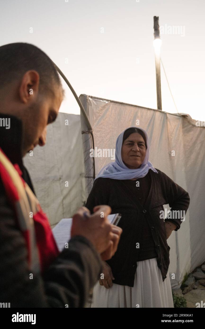 Gabriel Gauffre / Le Pictorium -  Bashur -  28/3/2021  -  Iraq / Iraqi Kurdistan / Erbil  -  Assessing the needs of a Yezidi woman in Khanke camp.  From the ashes of the 2003 American invasion of Iraq and the toppling of Saddam Hussein's regime, Iraq's Kurds managed to wrestle a form of relative independence. Still technically part of Iraq, Iraqi Kurdistan, in the north of the country, enjoys a heightened level of independence.  To the Kurds, it is Bas?r (Bahsur), the southern province of the 4 composing what could one day be their own country, Kurdistan.  Bashur is a territory that has all th Stock Photo