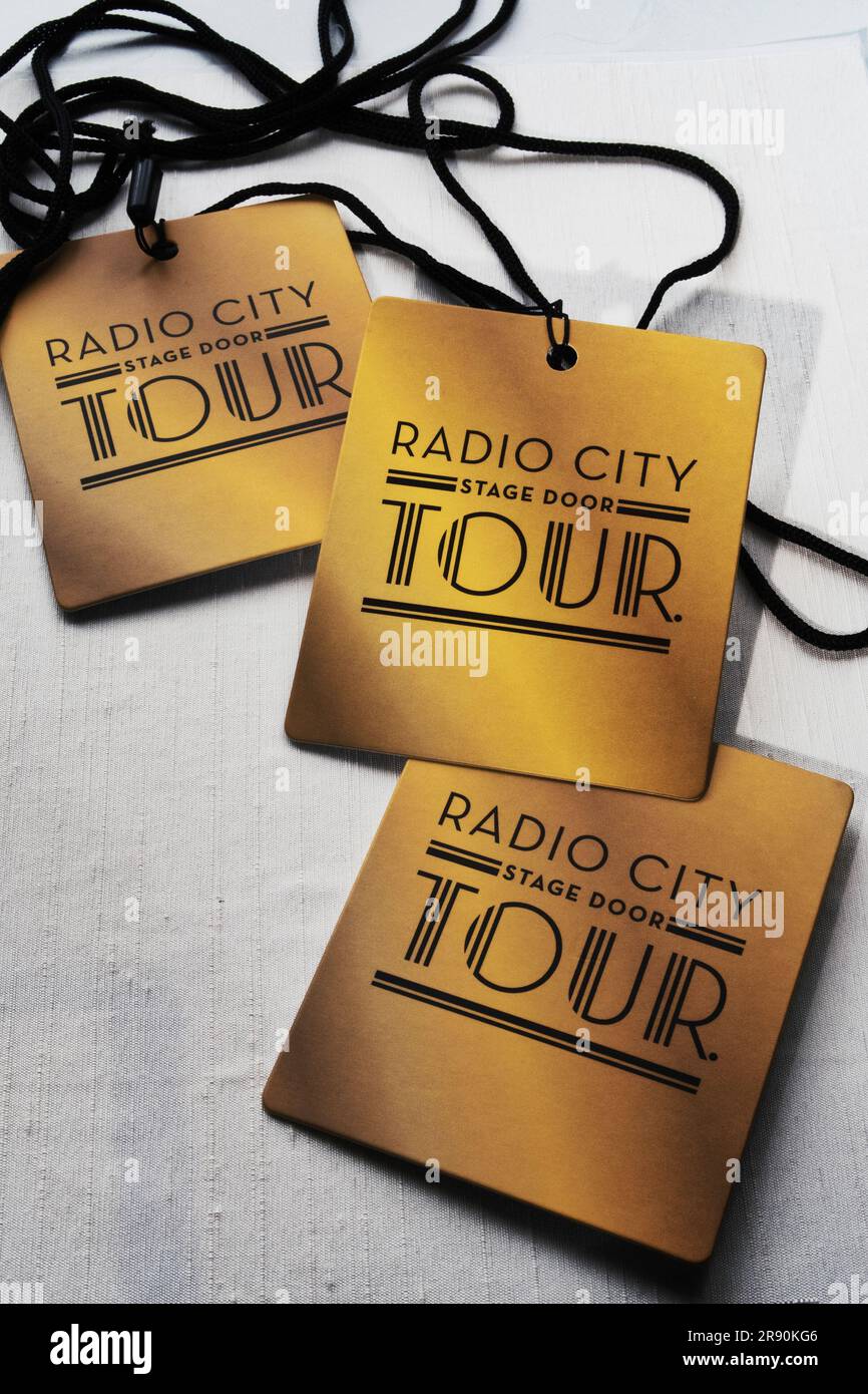 Radio City Stage door tour lanyards entry tickets for Rockefeller Center,  New York City, USA  2023 Stock Photo