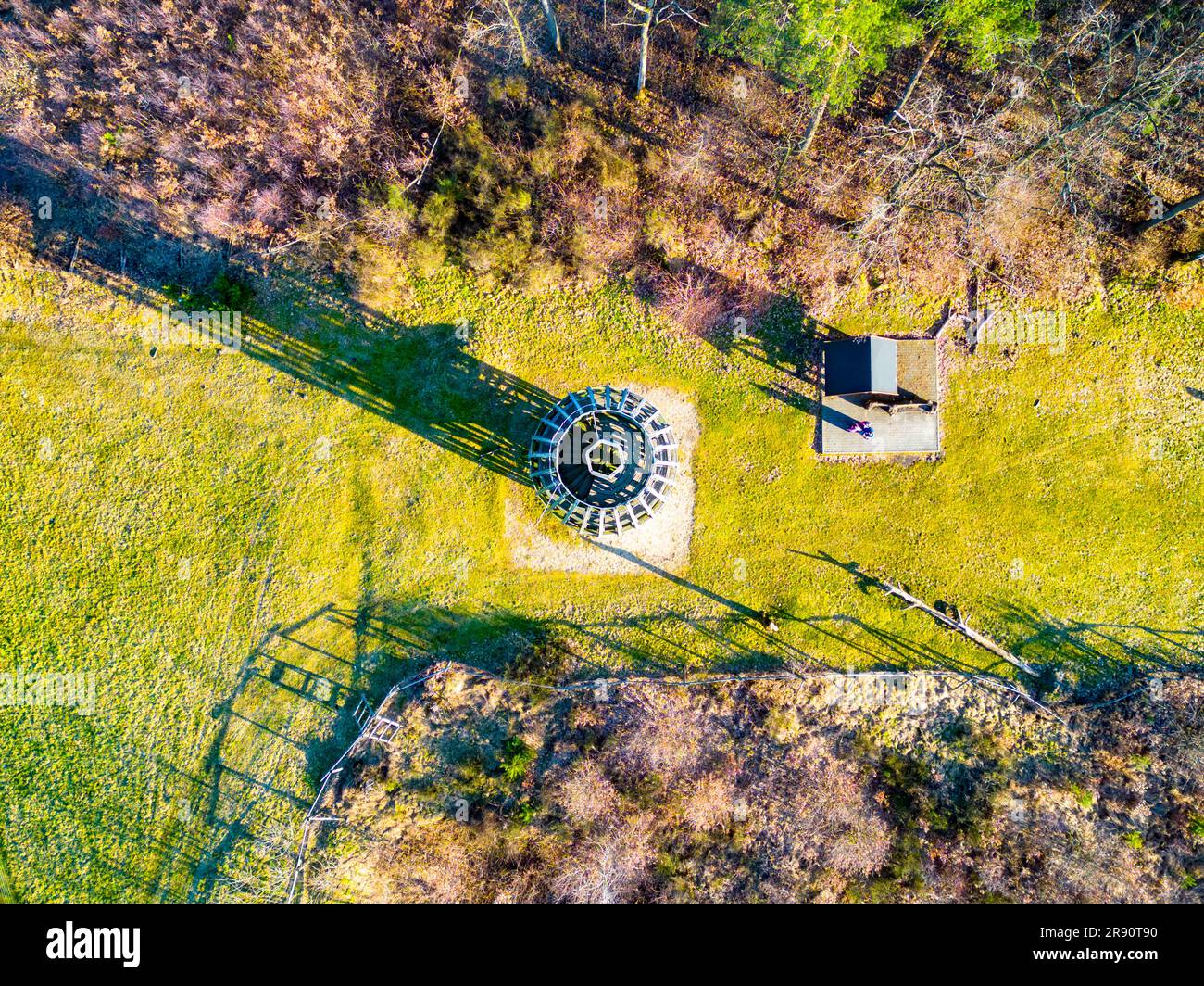 Wooden lookout tower in Hermanice on sunny spring day, Czech Republic. Aerial view from drone. Stock Photo