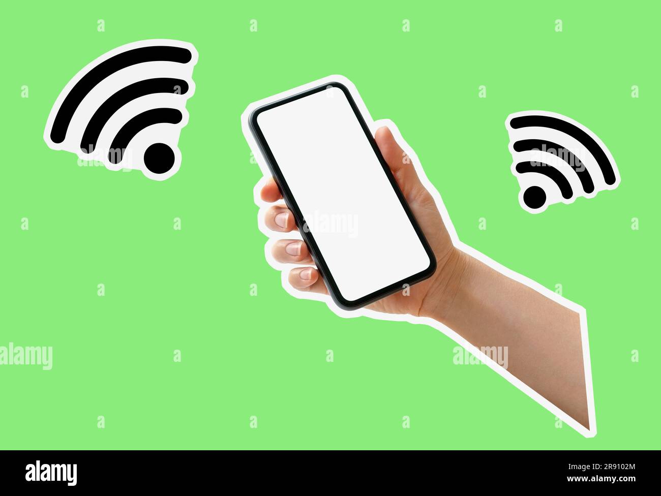 Cut out style composite image wi-fi icons and photo of smart phone with blank white screen in a hand on green background. Stock Photo
