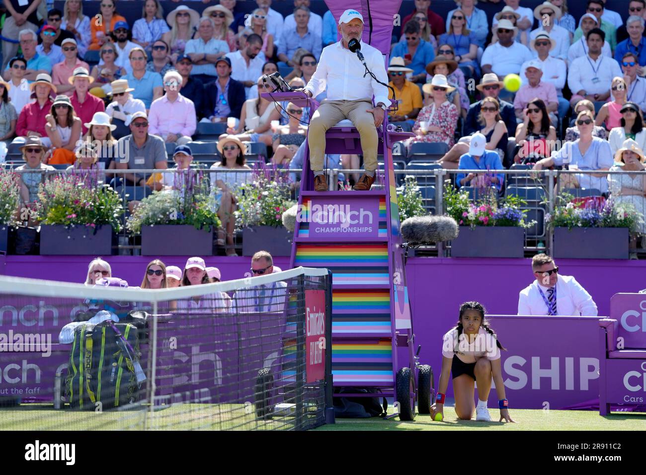 Umpire Fergus Murphy sits in a rainbow decorated chair on Pride Day as  Holger Rune of Denmark plays against Lorenzo Musetti of Italy during their  quarterfinal singles tennis match at the Queen's