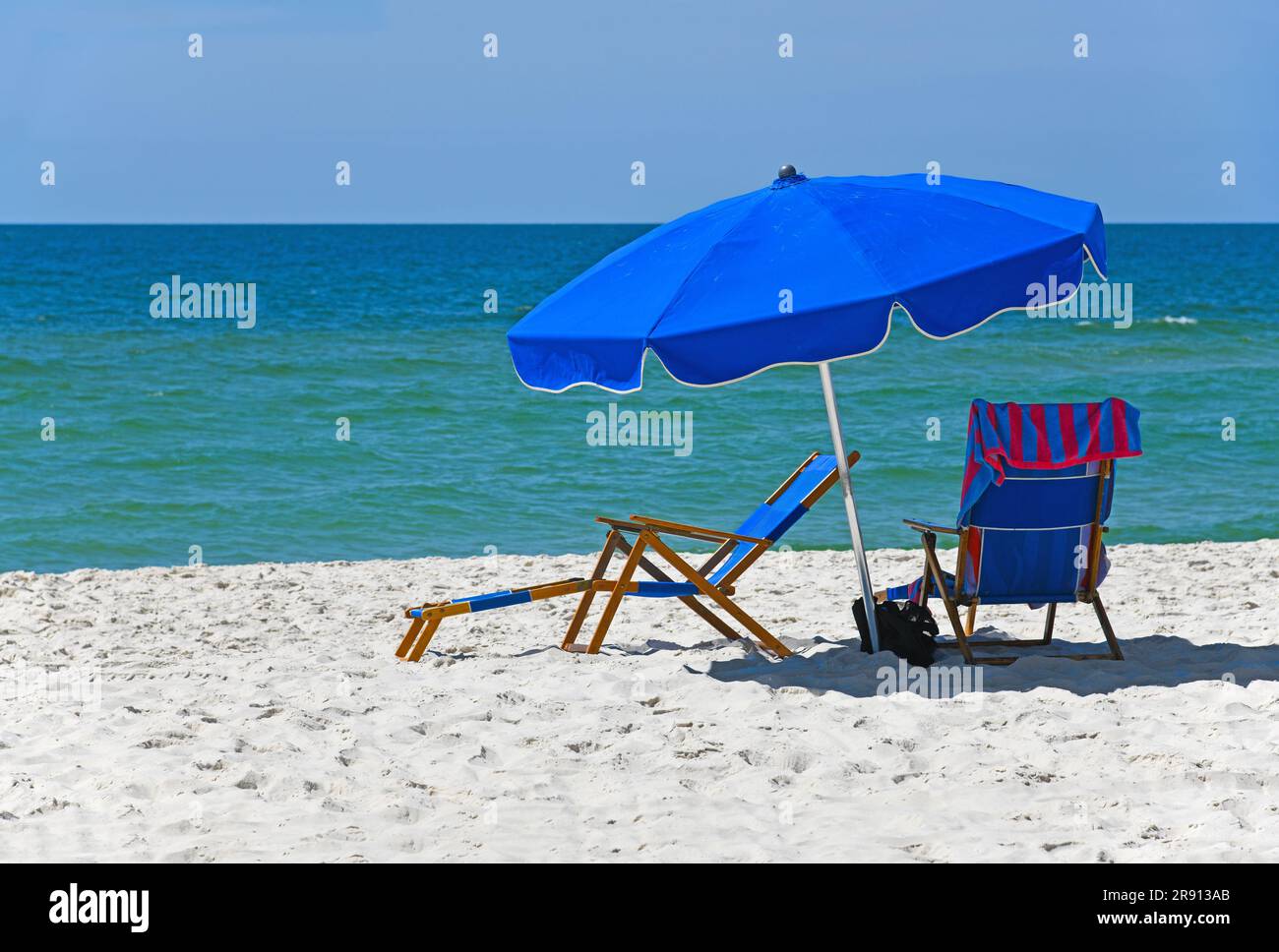 Blue Beach Chairs with Umbrella on White Sand Beach Stock Photo Alamy