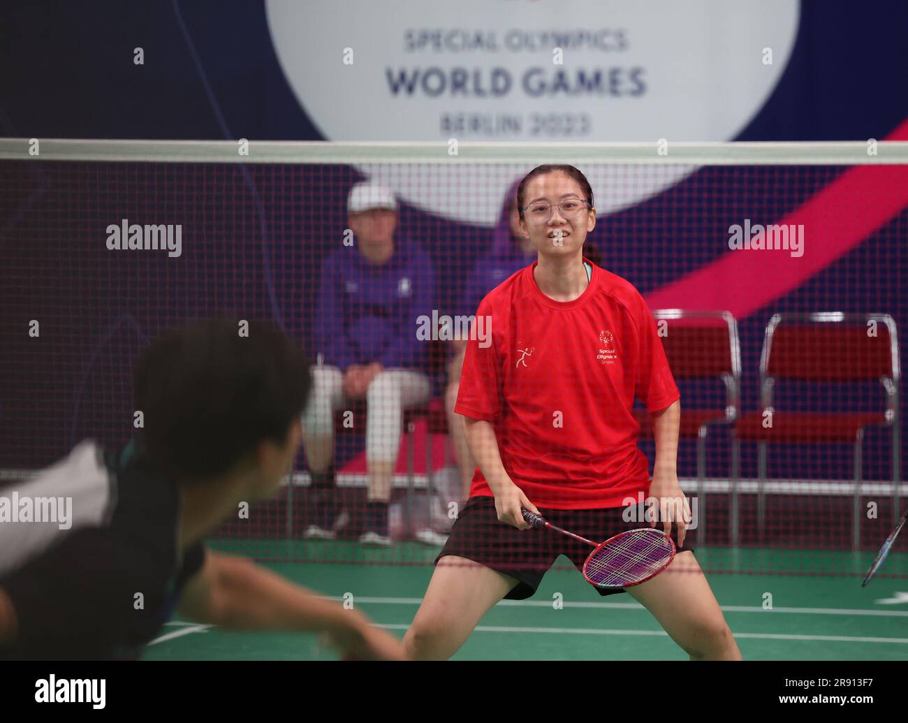 Berlin, Germany. 21st June, 2023. SO Singapore Tan/Bin Razid v SO Korea Lim/Lee compete on the badminton mixed doubles during the Special Olympics World Games Berlin 2023, the world's largest inclusive sports event where thousands of athletes with intellectual disabilities compete together in 26 sports from 17 to 25 June 2023. Credit: Isabel Infantes/Empics/Alamy Live News Stock Photo