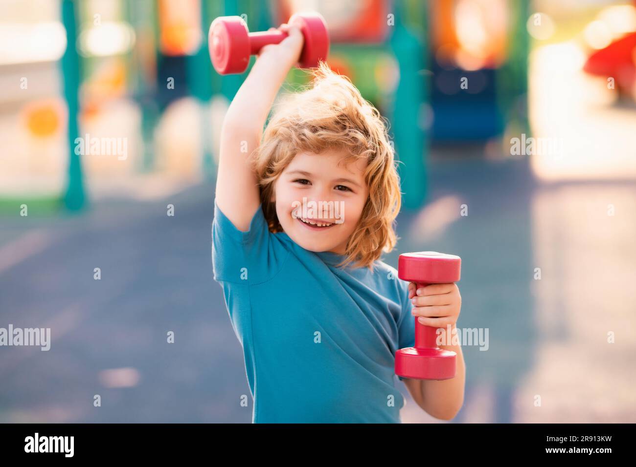 Work Out Kid Kids sport training on playground outdoor. Child workout. Kid sport ...