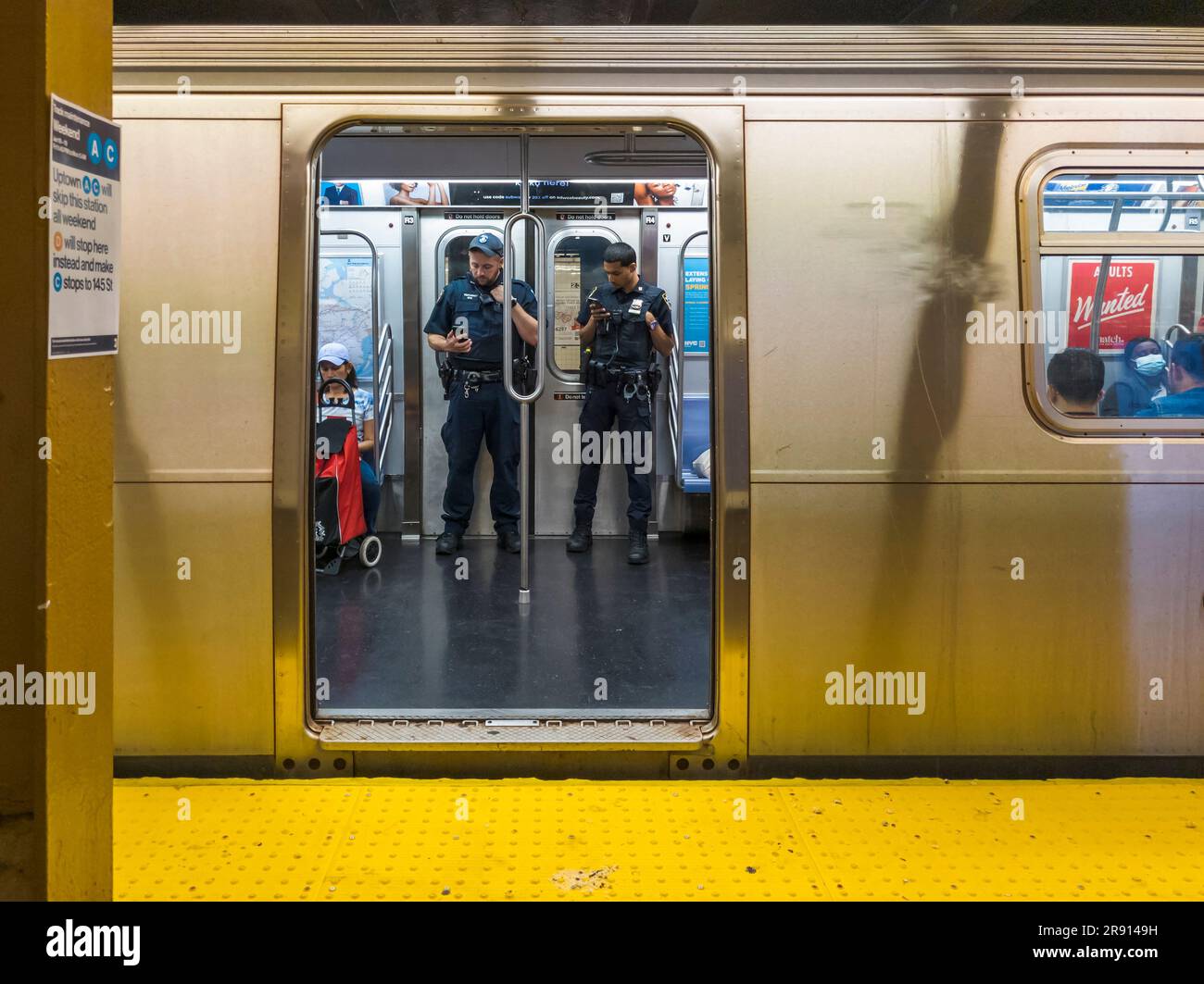nypd-officers-on-a-c-train-in-the-new-york-subway-on-saturday-june-17